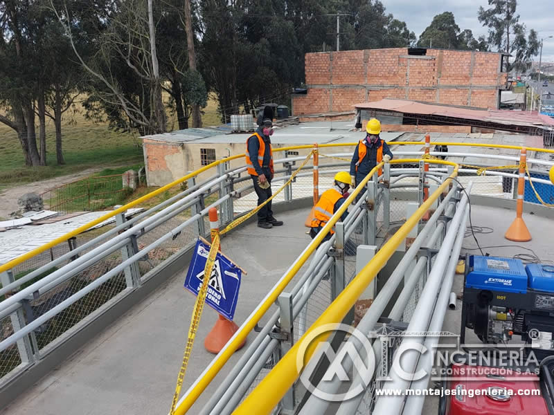 Mantenimiento de barandas y reparación de estructura metálica de puente peatonal en Bogotá, Colombia. Montajes, Ingeniería y Construcción. MIC SAS.