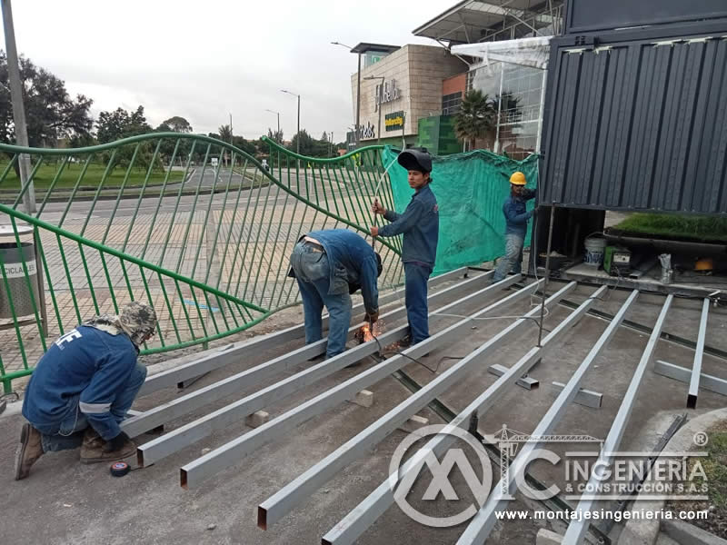 Componentes metálicos de calidad para pisos industriales y acceso comercial en Bogotá, Colombia. Montajes, Ingeniería y Construcción. MIC SAS.