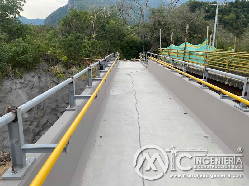 Diseño e instalación de vigas, columnas y elementos estructurales metálicos en puentes y pasarelas peatonales en Bogotá, Colombia. Montajes, Ingeniería y Construcción. MIC SAS. Diseño e instalación de vigas, columnas y elementos estructurales metálicos en puentes y pasarelas peatonales en Bogotá, Colombia. Montajes, Ingeniería y Construcción. MIC SAS.